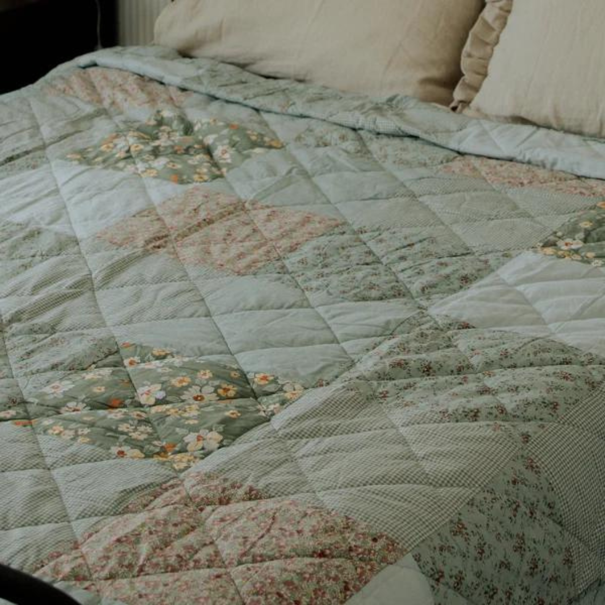 green detailed quilt 