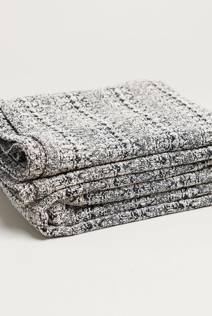 Grey and black boucle jacquard throw blanket