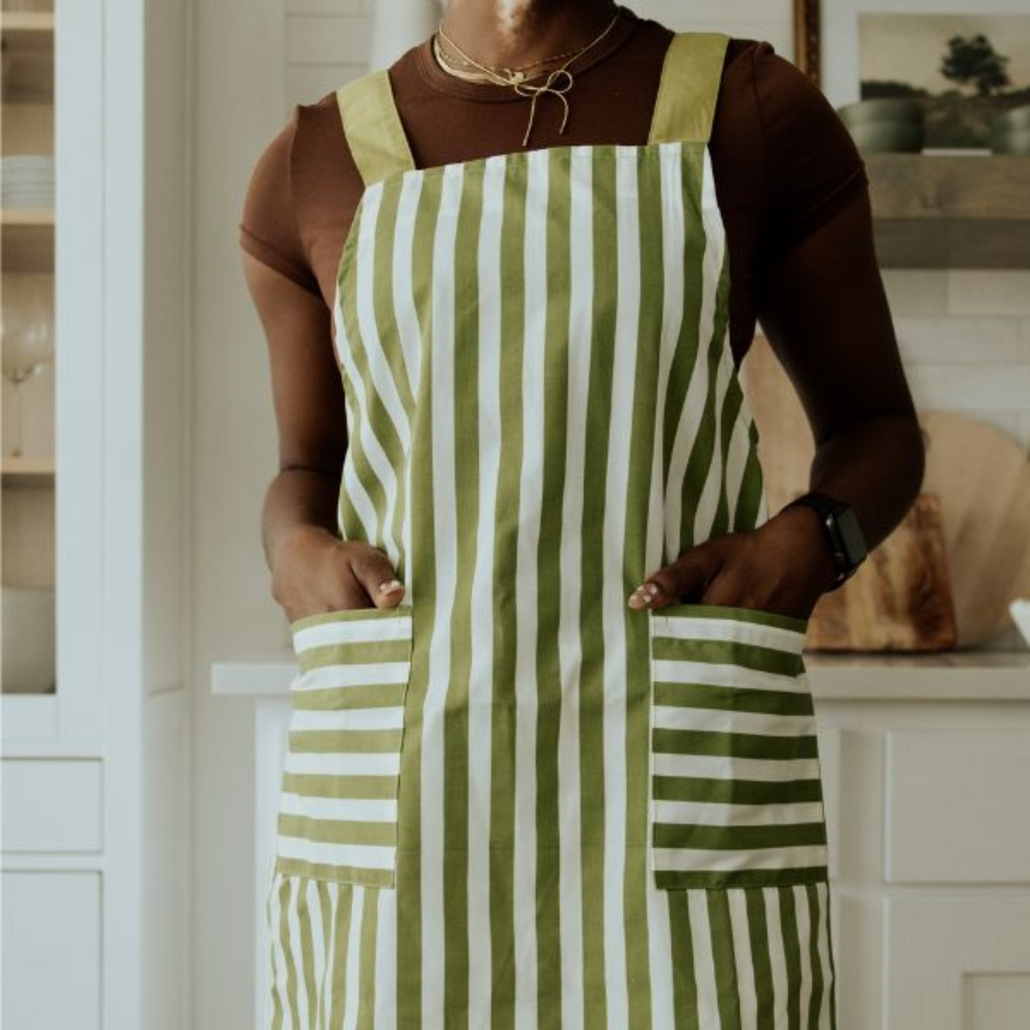 green apron with white stripes