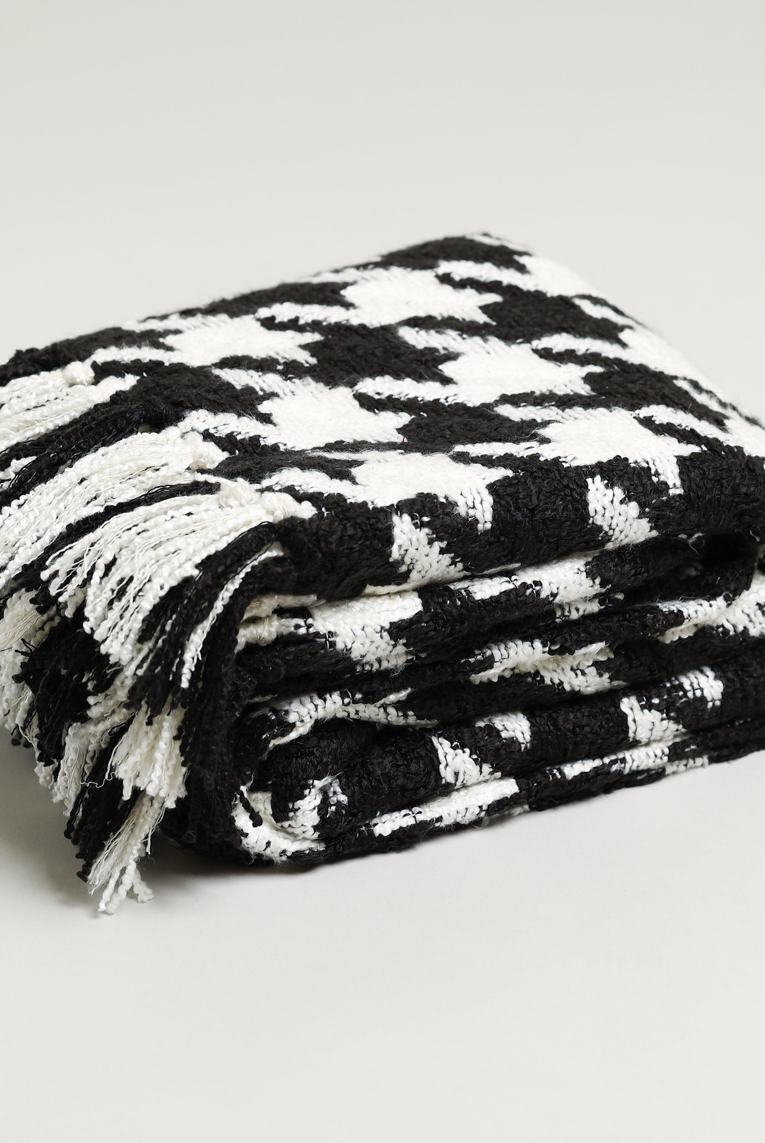 chunky black and white houndstooth popular throw blanket with black and white tassels