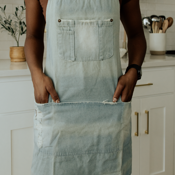 close up of denim apron pockets