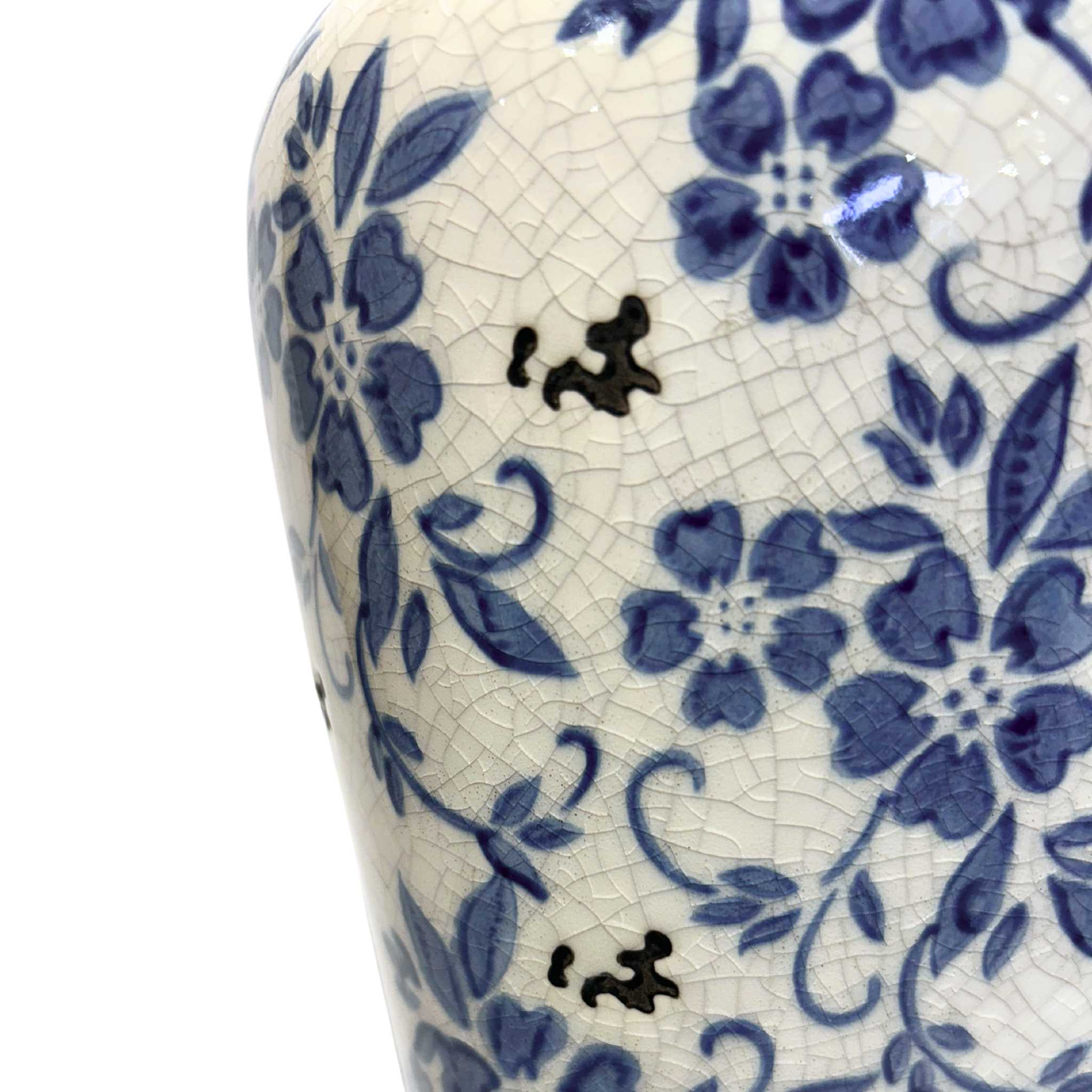 detailed crackle texture in a blue and white floral design porcelain flower vase