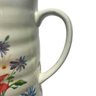 floral white ceramic pitcher handle