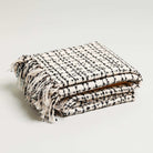 simple checkered geometric style throw blanket folded