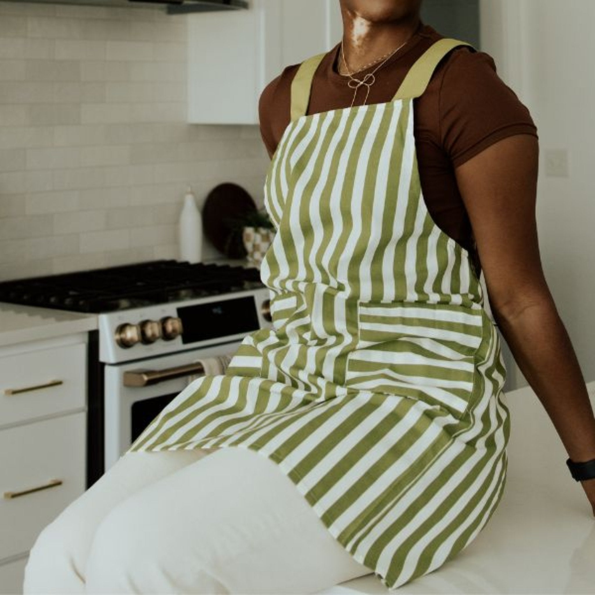 green apron with white stripes