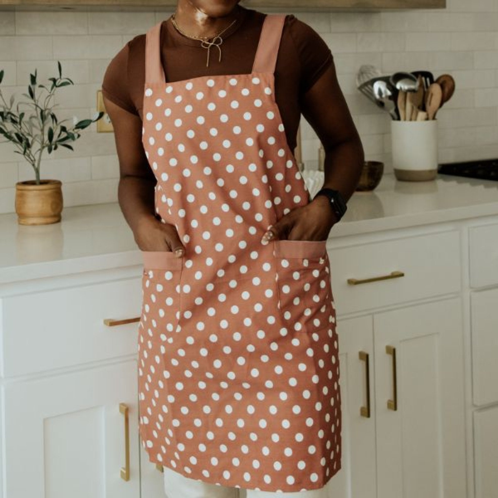 red apron with white polka dots