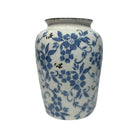 porcelain round vase for flowers with flower design on it