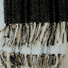 white and black acrylic cotton throw blanket with unique tassels